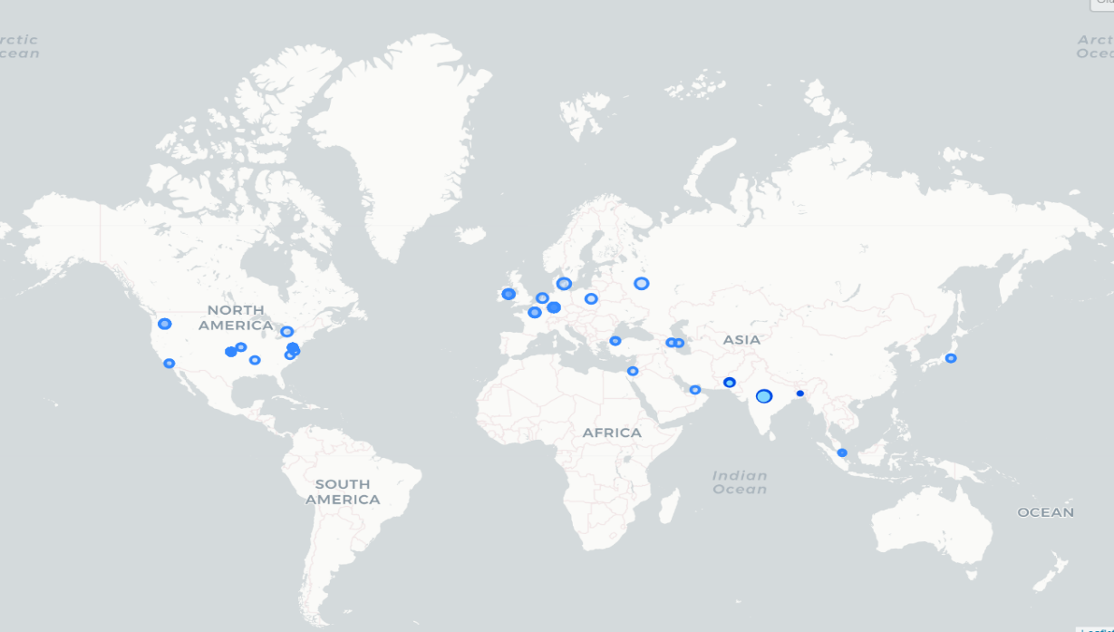 A map of the world with blue dots

Description automatically generated