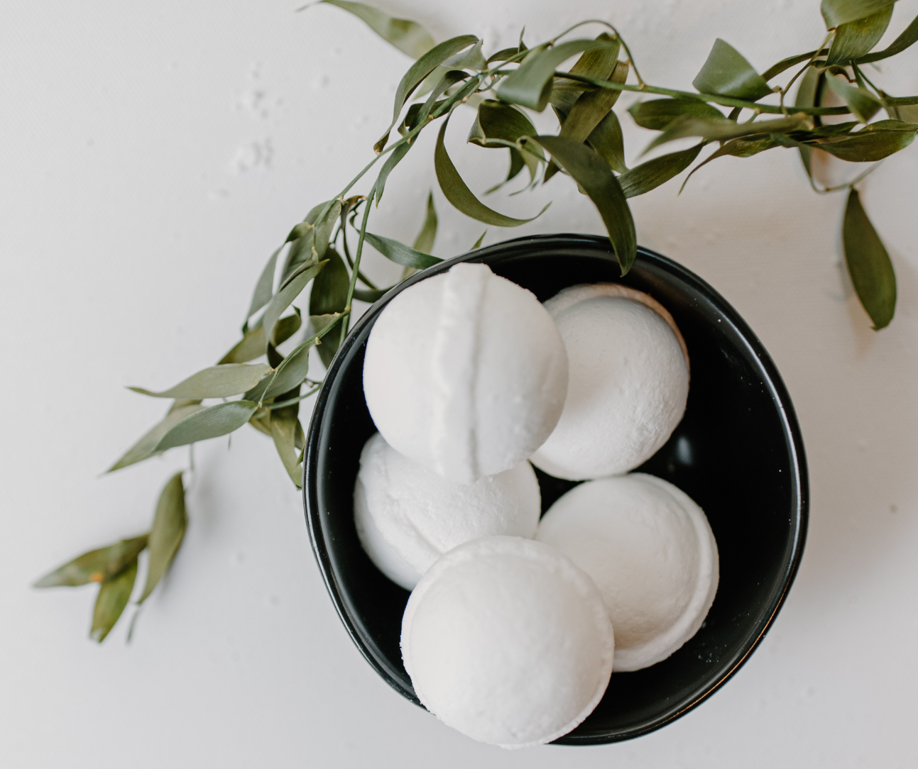 a bowl of white bath bomb balls