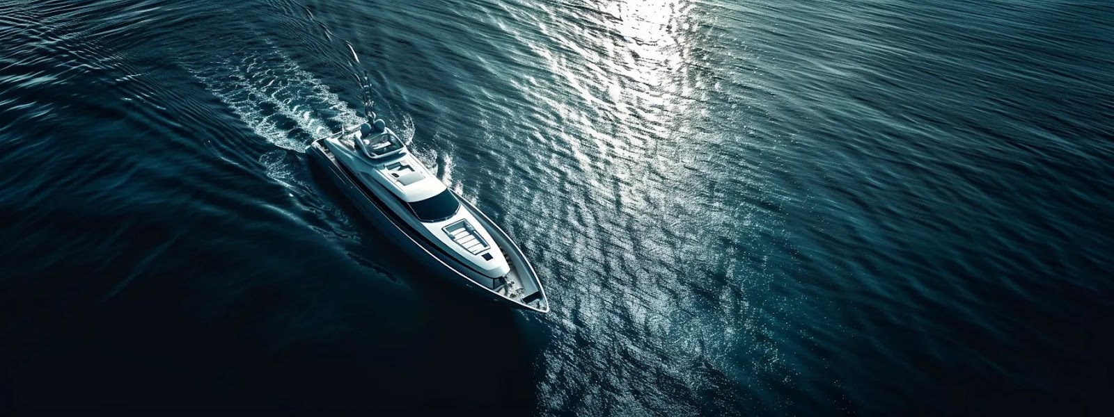 a sleek, silver yacht gliding gracefully across sparkling blue waters, ready to be exchanged for a stack of cash.