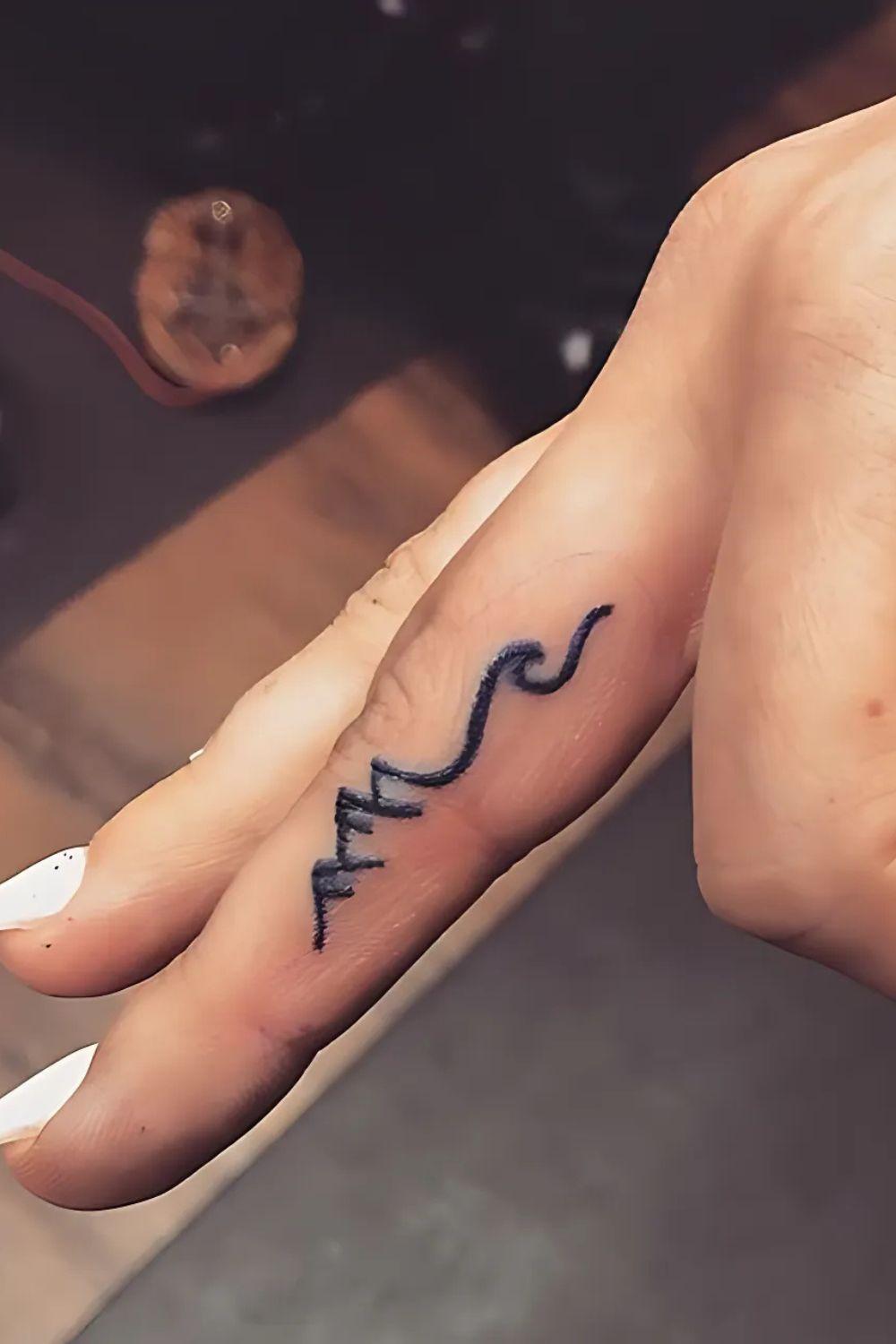 Wave Finger Tattoo