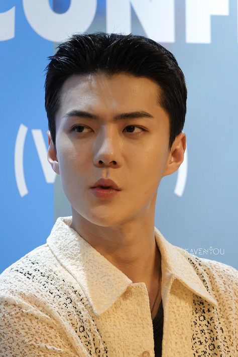 This contains an image of EXO Sehun 