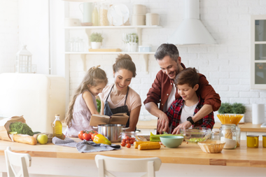 signs that its time for a kitchen remodel family cooking meal together at island custom built michigan