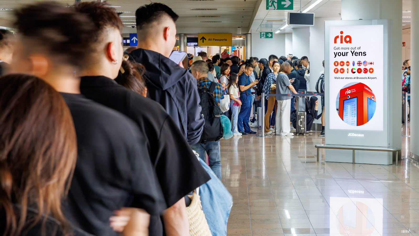 Ria's DOOH campaign in airport with exclusive flight data 