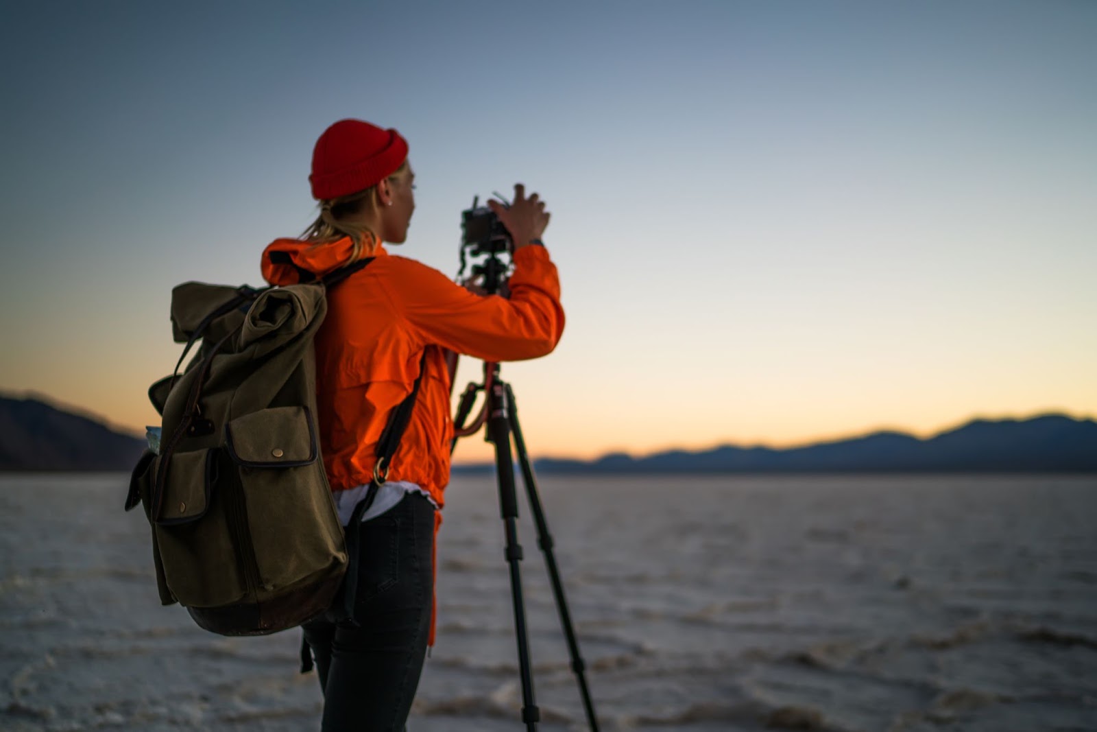 Back view of a photographer taking a picture