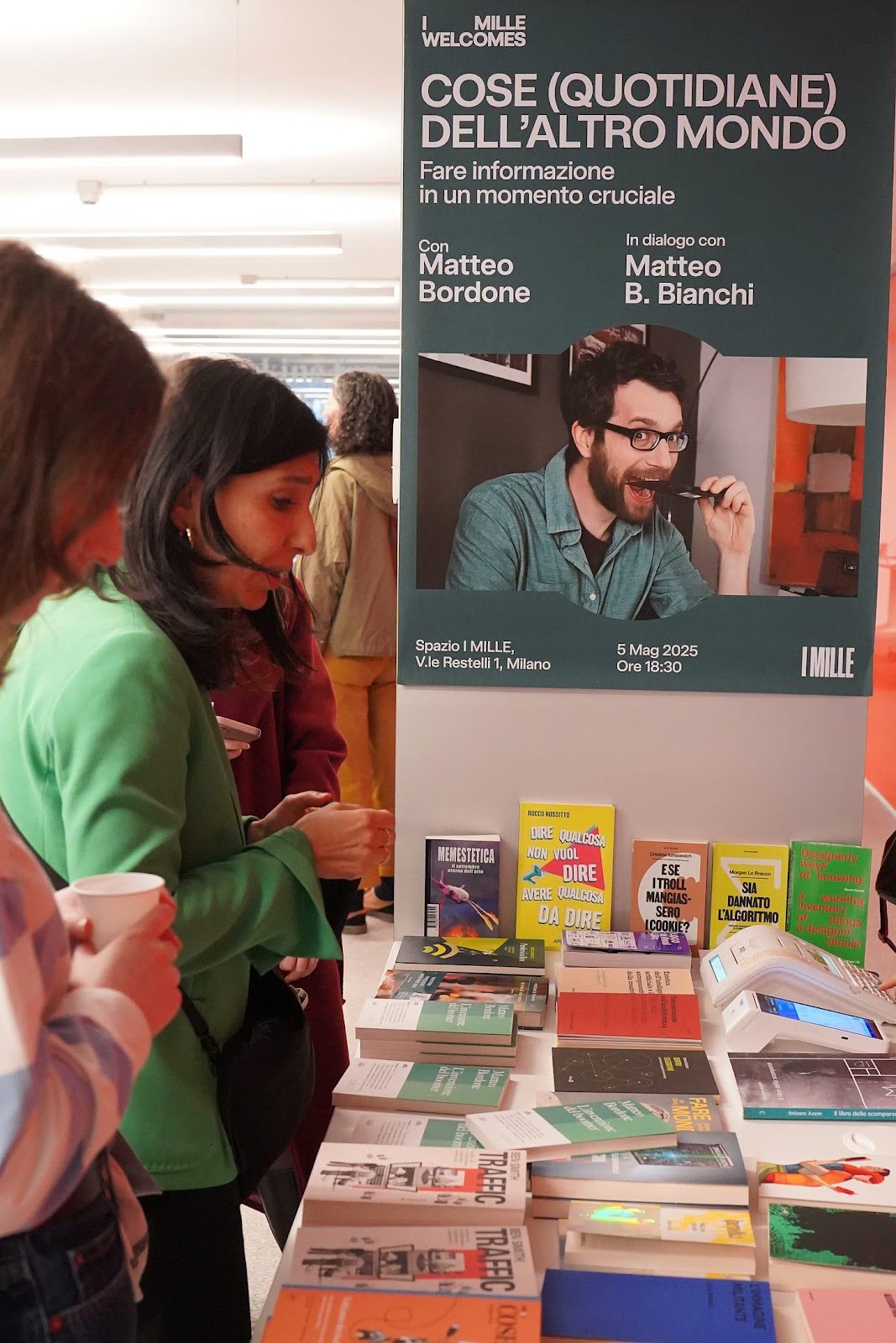 A group of people looking at a poster

AI-generated content may be incorrect.