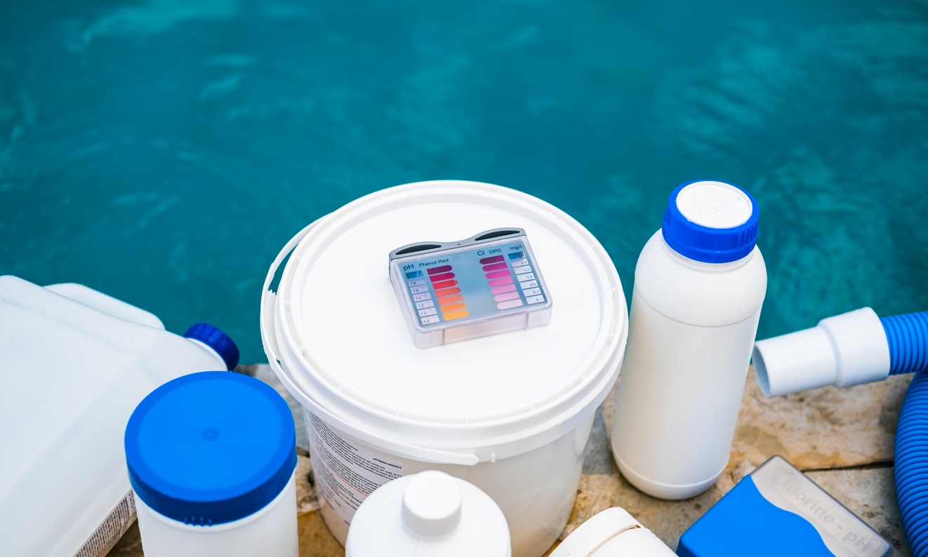 An assortment of pool cleaning equipment used to balance water chemistry levels.