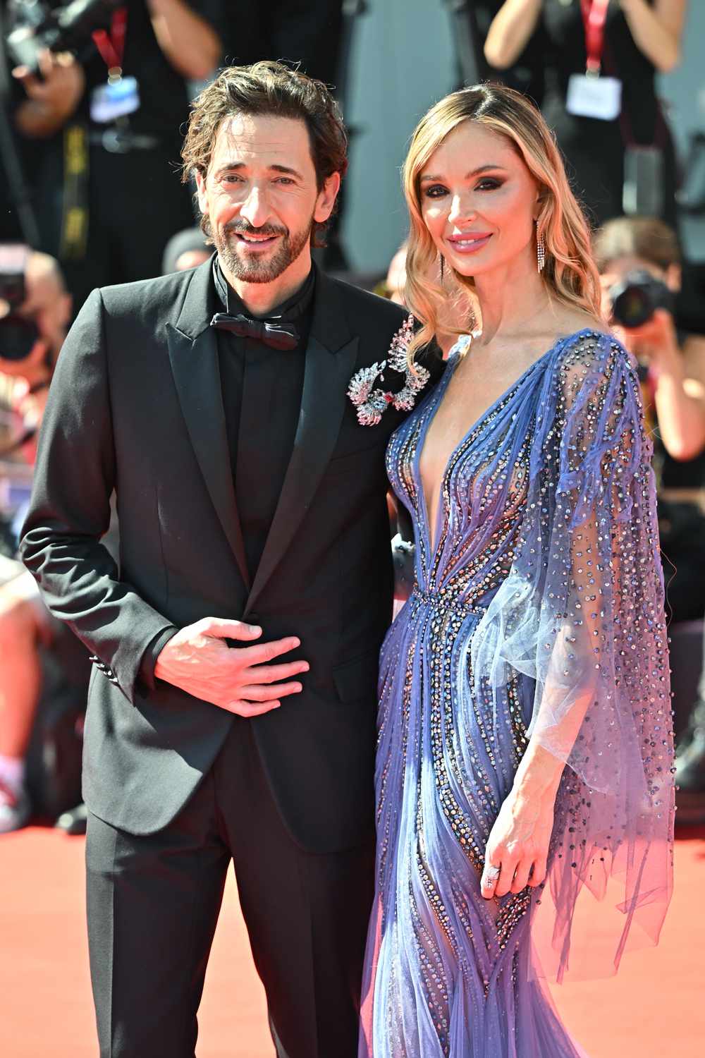 Adrien Brody and Georgina Chapman attend the 'The Brutalist' red carpet during the 81st Venice International Film Festival on September 01, 2024 in Venice, Italy. 