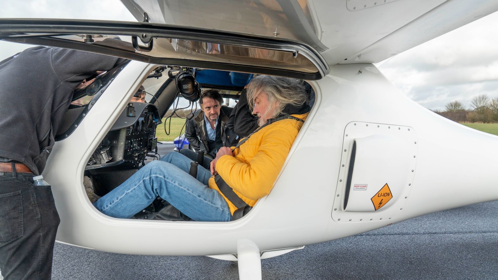James May and Richard Hammond prepare to race a Porsche Taycan Turbo GT versus electric plane