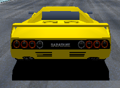 Backside of a yellow racing car. 