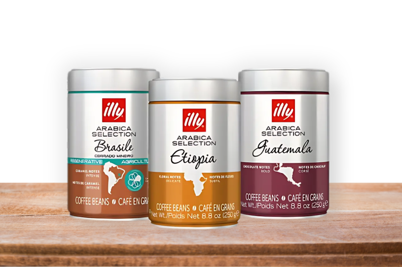 A picture of three Illy Single Origin Coffee Beans cans