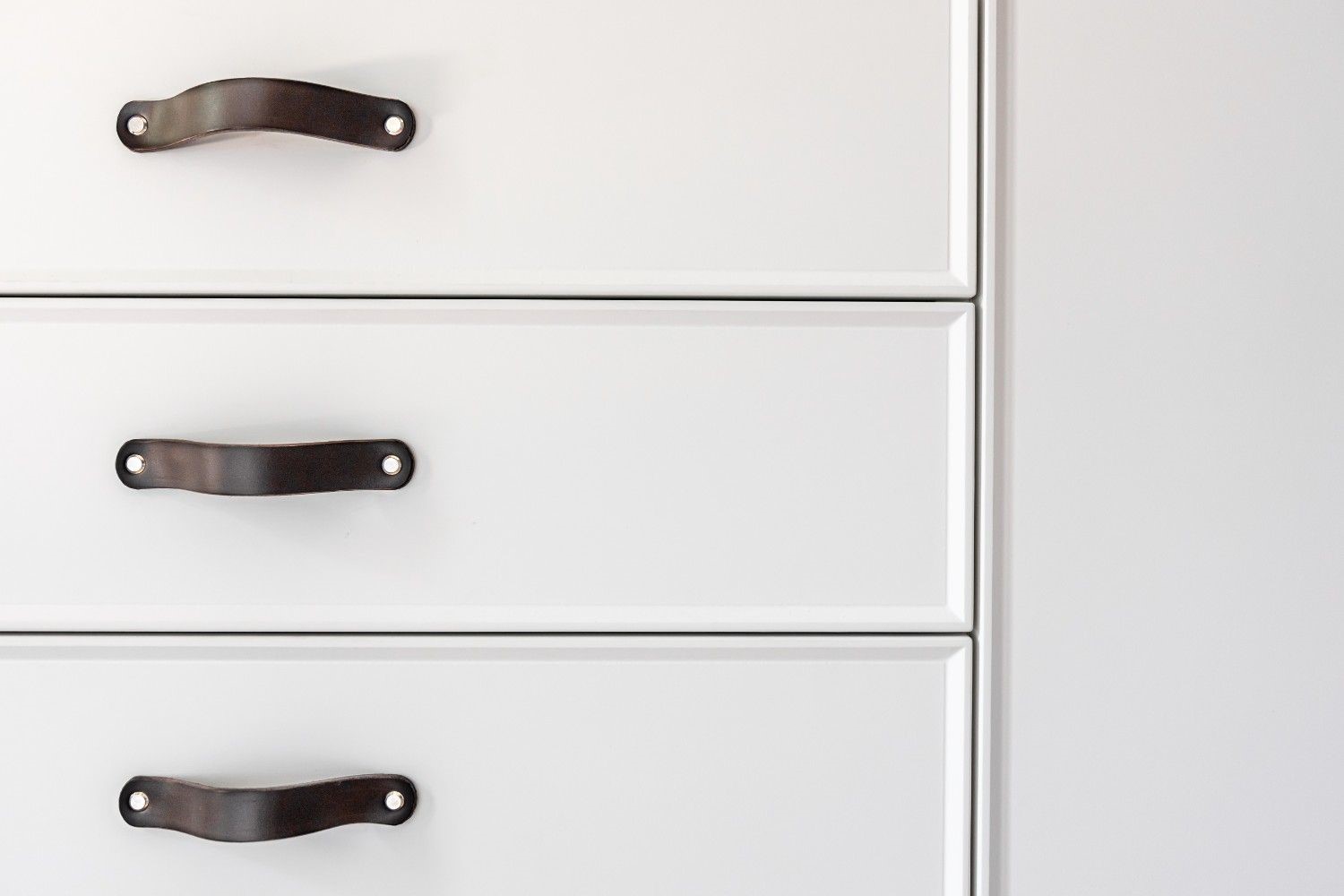 Quality construction details in Elegante modular kitchen showing premium plywood and German hardware