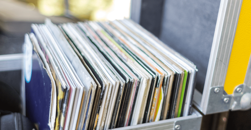 Vinyl records in a metal lockbox, ready for storage.
