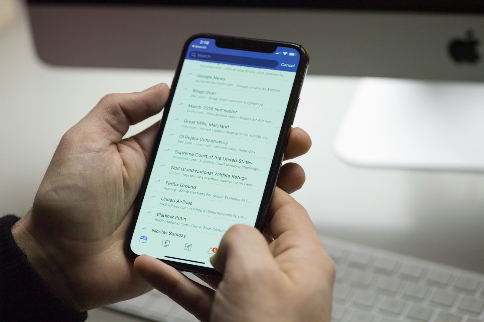 A person holding a smartphone.
