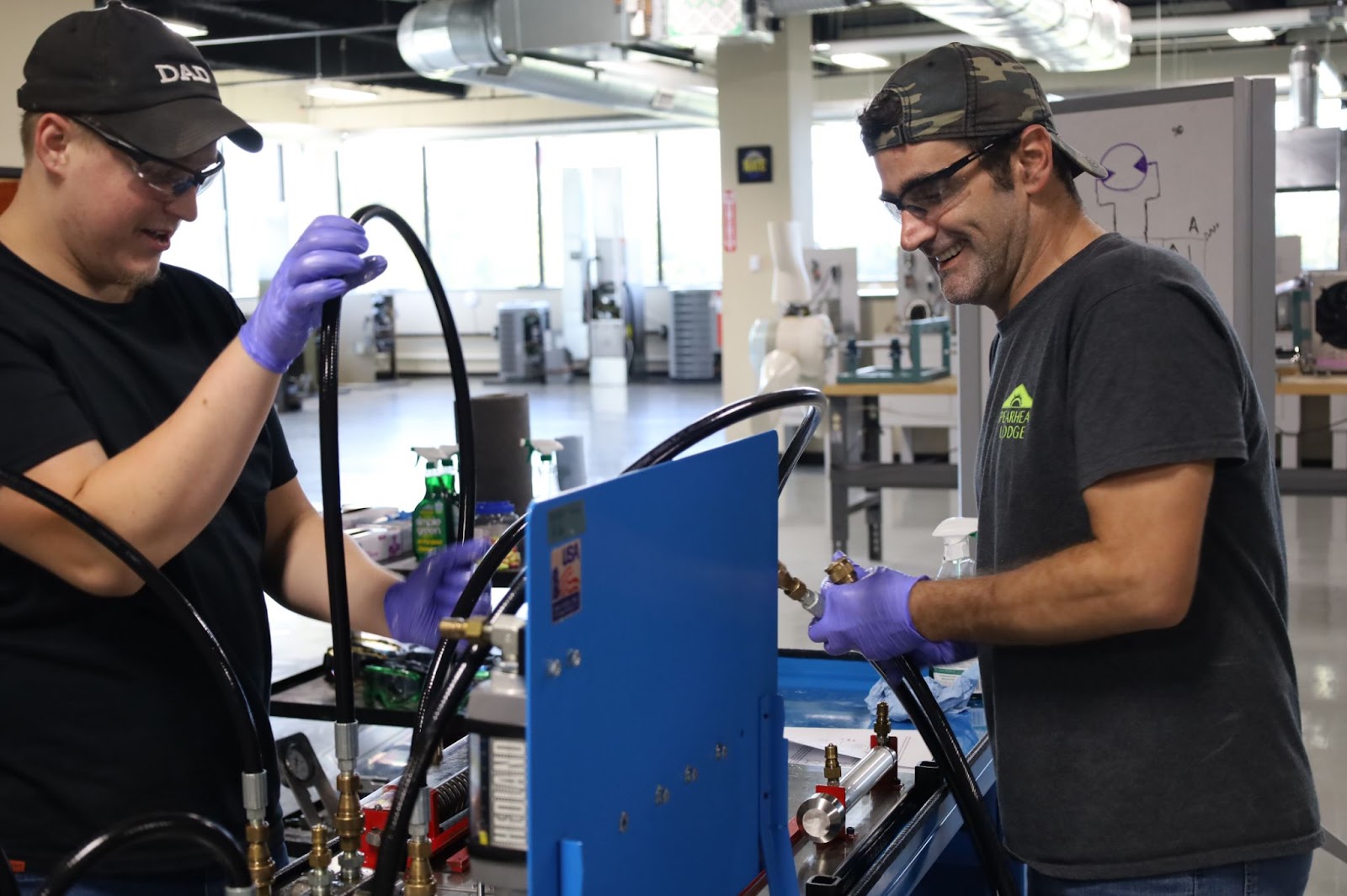 Students at Pinnacle Career Institute working on systems that would be found in a wind turbine