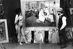 https://upload.wikimedia.org/wikipedia/commons/thumb/4/48/Toulouse-Lautrec_in_his_workshop_with_a_nude_model_%28photo_by_Maurice_Guibert%29.jpg/250px-Toulouse-Lautrec_in_his_workshop_with_a_nude_model_%28photo_by_Maurice_Guibert%29.jpg