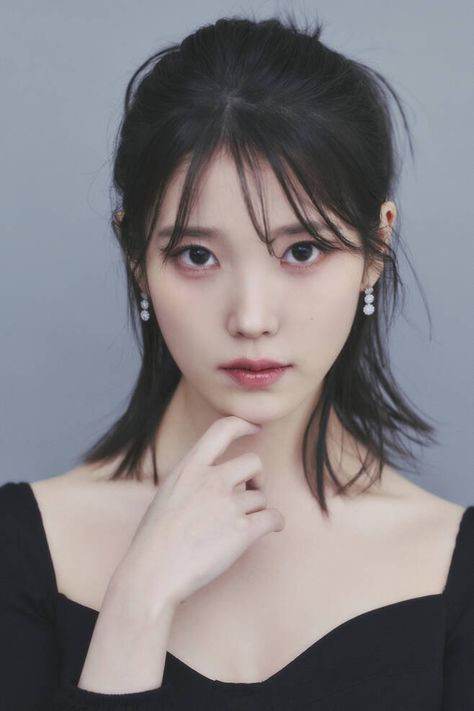 This contains an image of IU