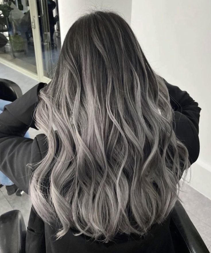 Woman with Muted gray balayage hair