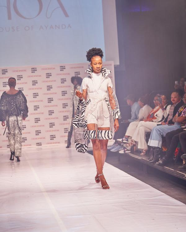 Model walks the runway in House of Ayanda designs at Soweto Fashion Week