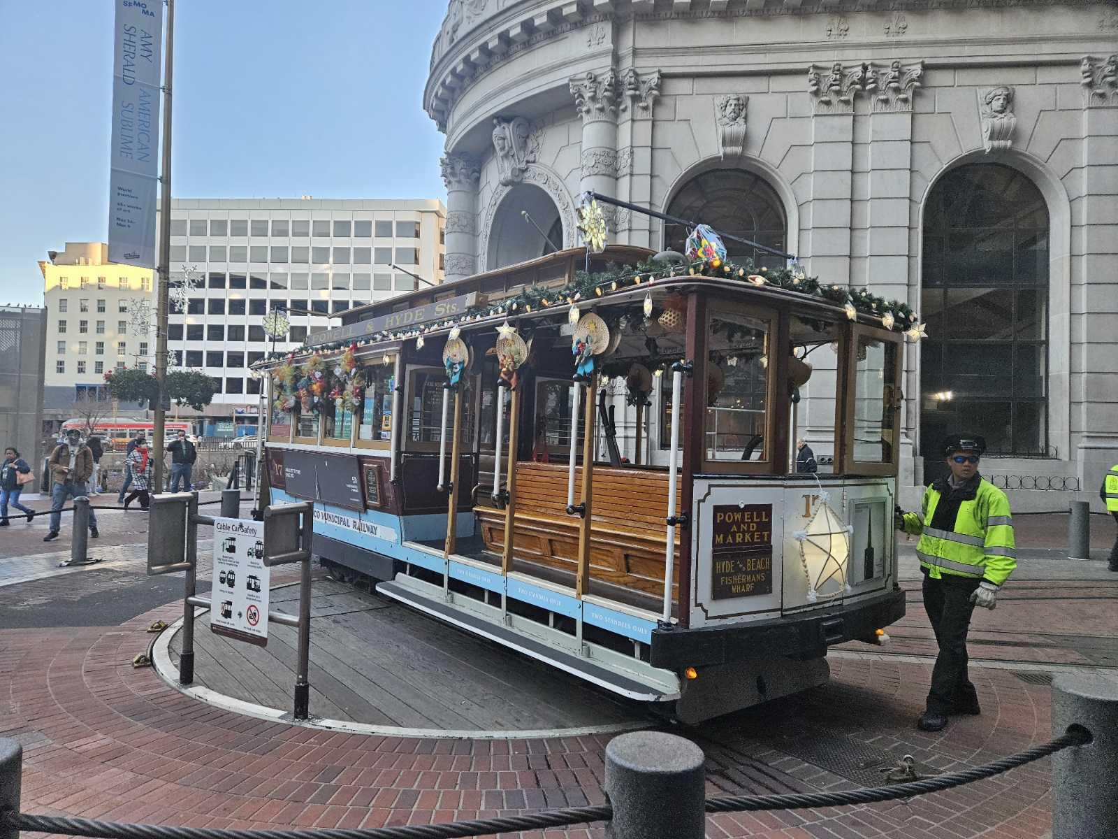 A trolley on a street

Description automatically generated