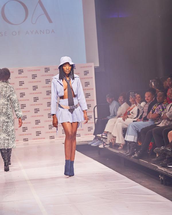 Model walks the runway in House of Ayanda designs at Soweto Fashion Week