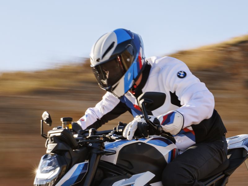 a rider on a BMW motorcycle wearing BMW Motorsport gear