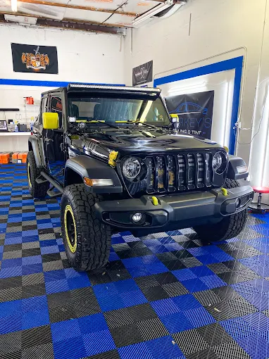 A Window Tinted and Ceramic Coated Car in Sharkey's Detailing & Tint Sarasota Workshop.