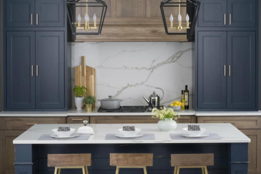 perfecting your culinary space comparing design elements for three kitchen sizes large vertical cabinets with marble backsplash in home remodeling project custom built michigan