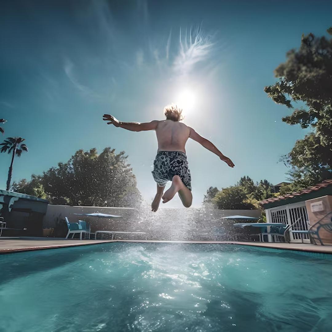 Boy jumping to Swimming Pool - supertramp.co.uk