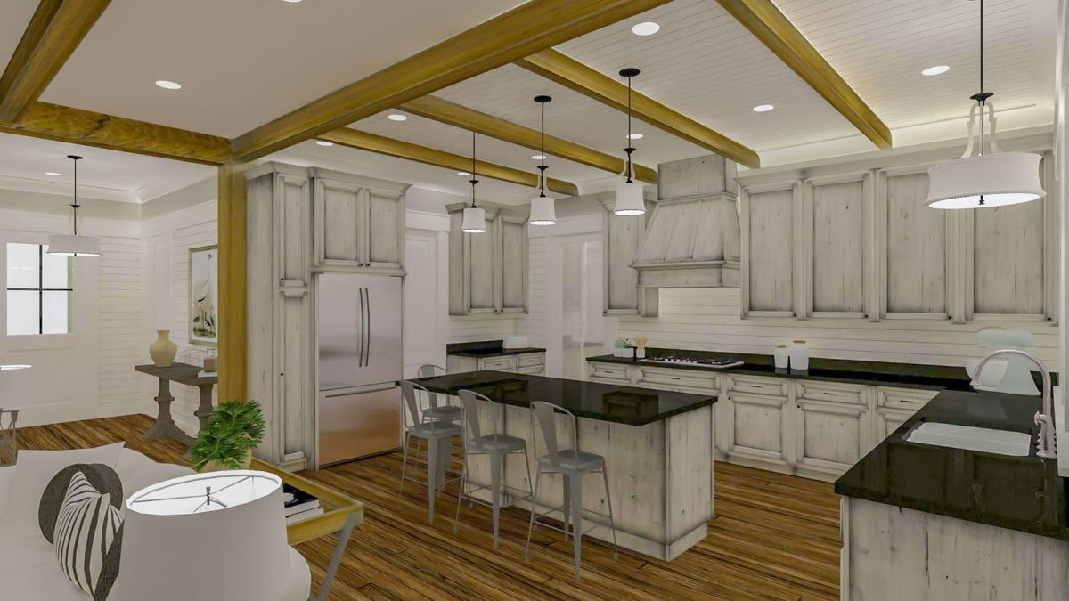 Exposed wooden beams add character to the gourmet kitchen.