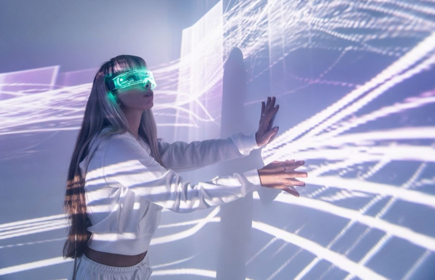 A girl immerses herself in technology