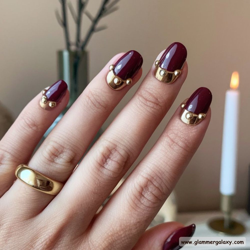 Classy Fall Nails having Burgundy Nails with Gold Cuffs