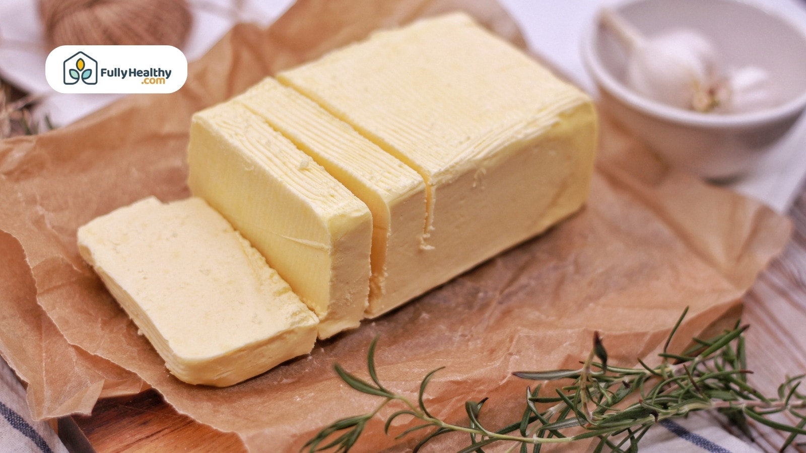 Butter blocks stacked neatly on a wooden surface