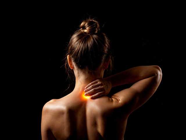 Woman with neck pain.
