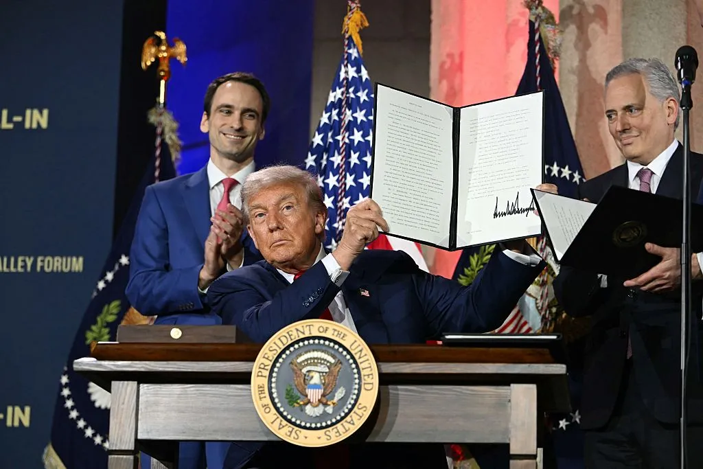 President Donald Trump signs ban against woke AI
