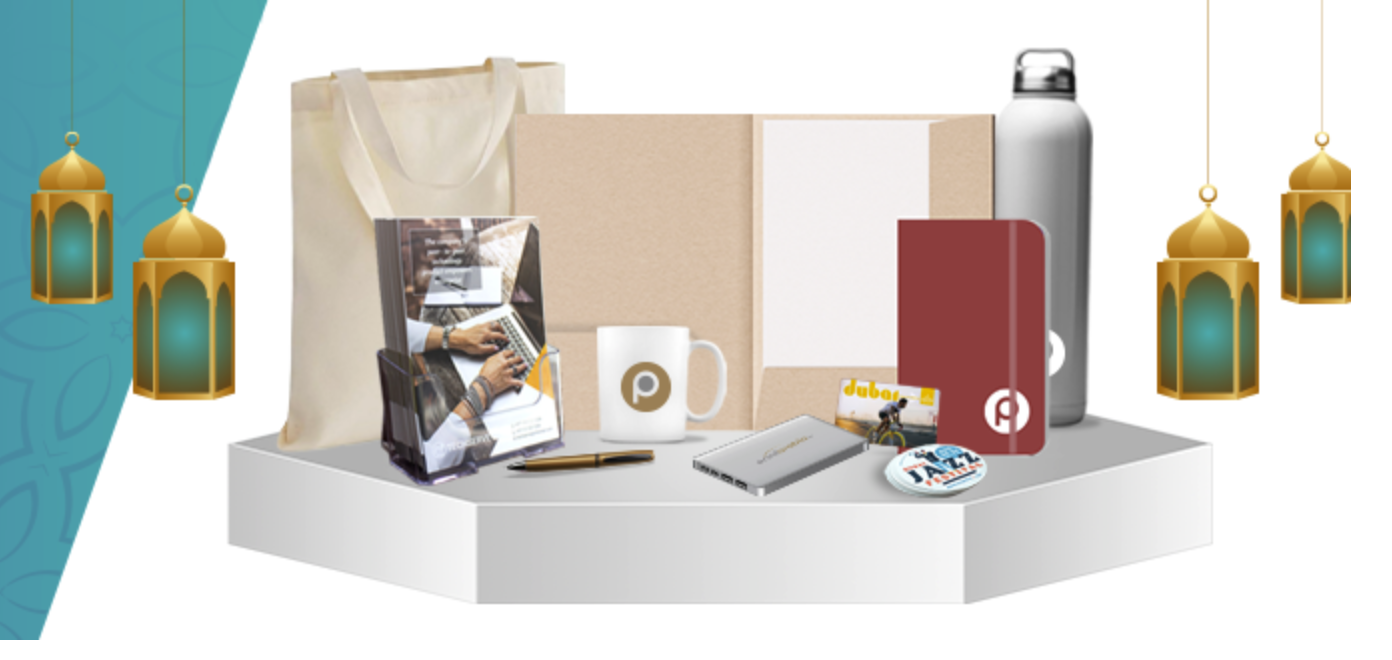 Imgae showing different corporate gifts Mugs,Pens, Power Bank, red colour diary, water bottle with company logo, tote 
