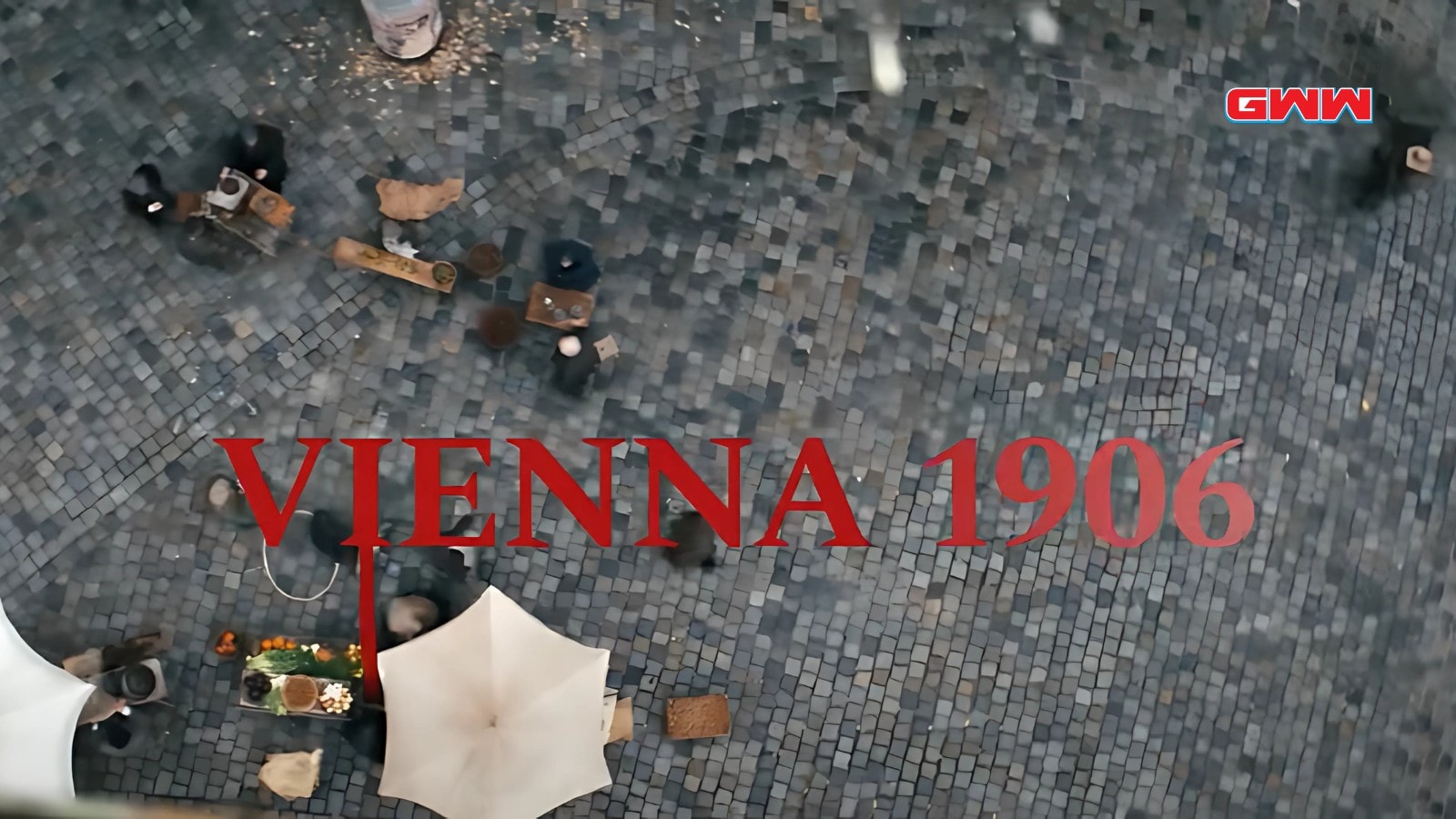 Vienna's bustling street market scene with cobblestone, set in 1906