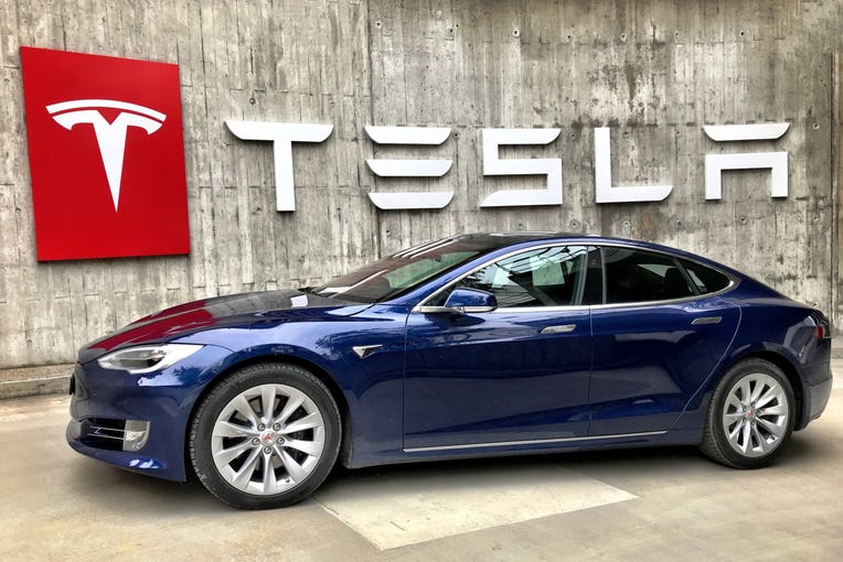 How To Buy Tesla (TSLA) Stocks And Shares – Forbes Advisor UK