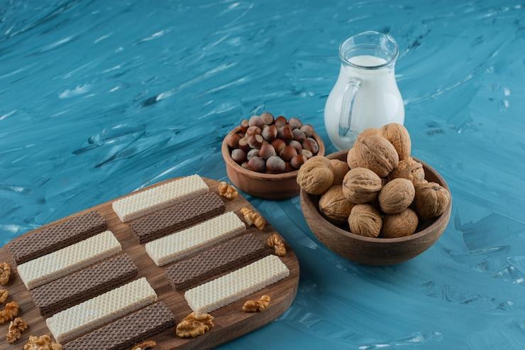 Turkish delights with peanut nuts on a dark wooden plate