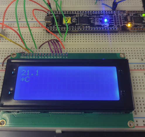 LCD screen displaying 21.1 degrees Celsius