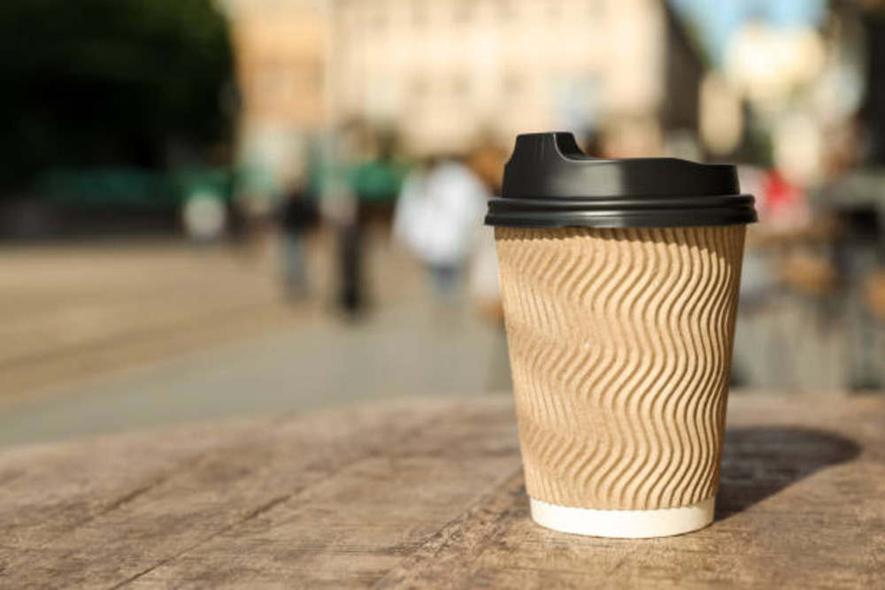 Customize eco-friendly coffee cup with unique design.