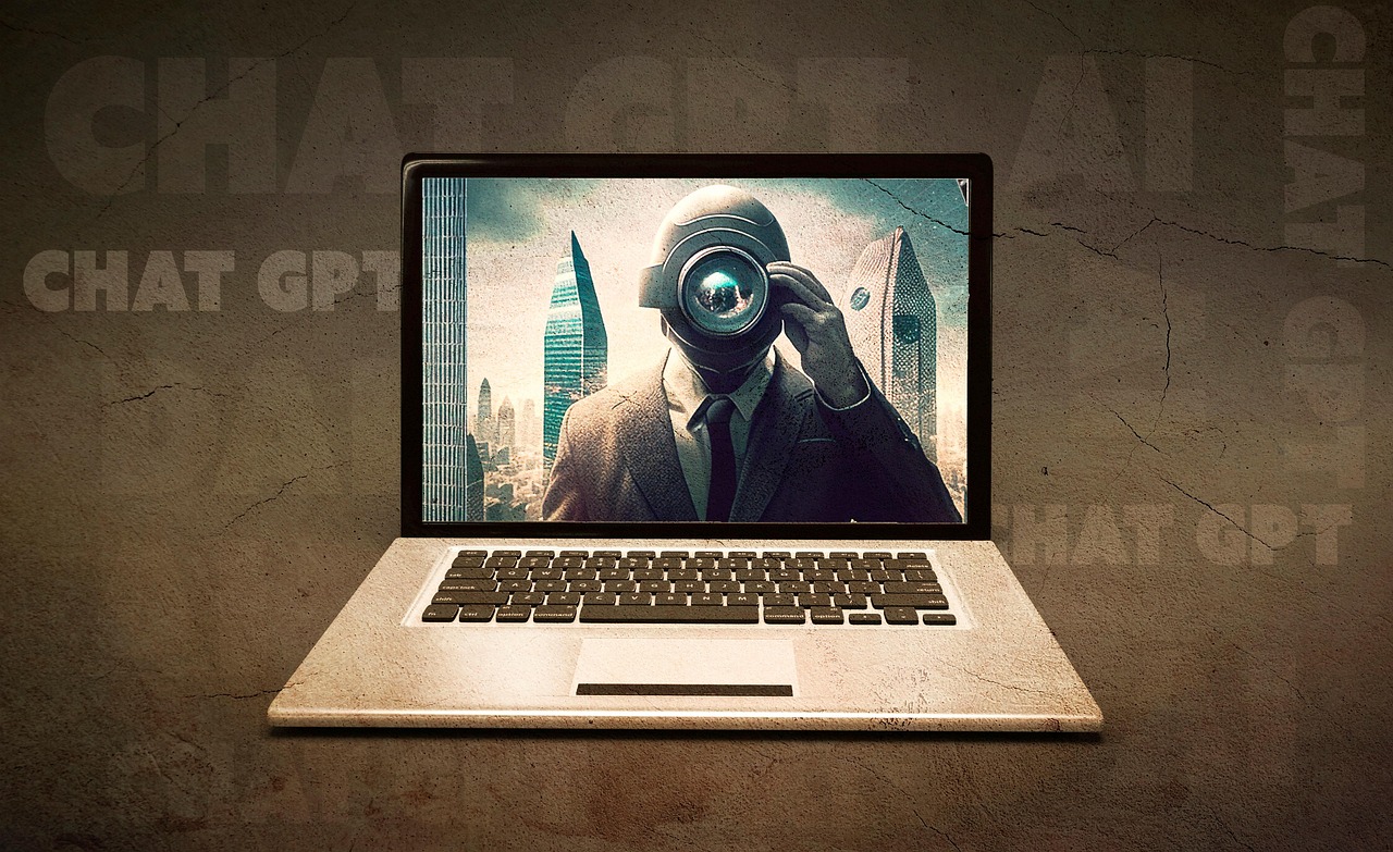 A laptop with the image of AI, represented as a human with a machine as its head.