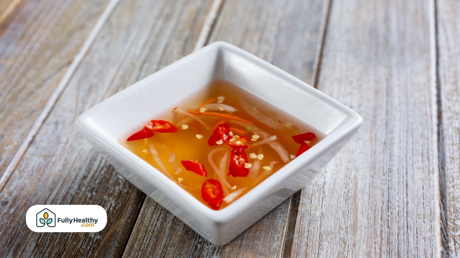 Fish sauce with chili and garlic in square bowl