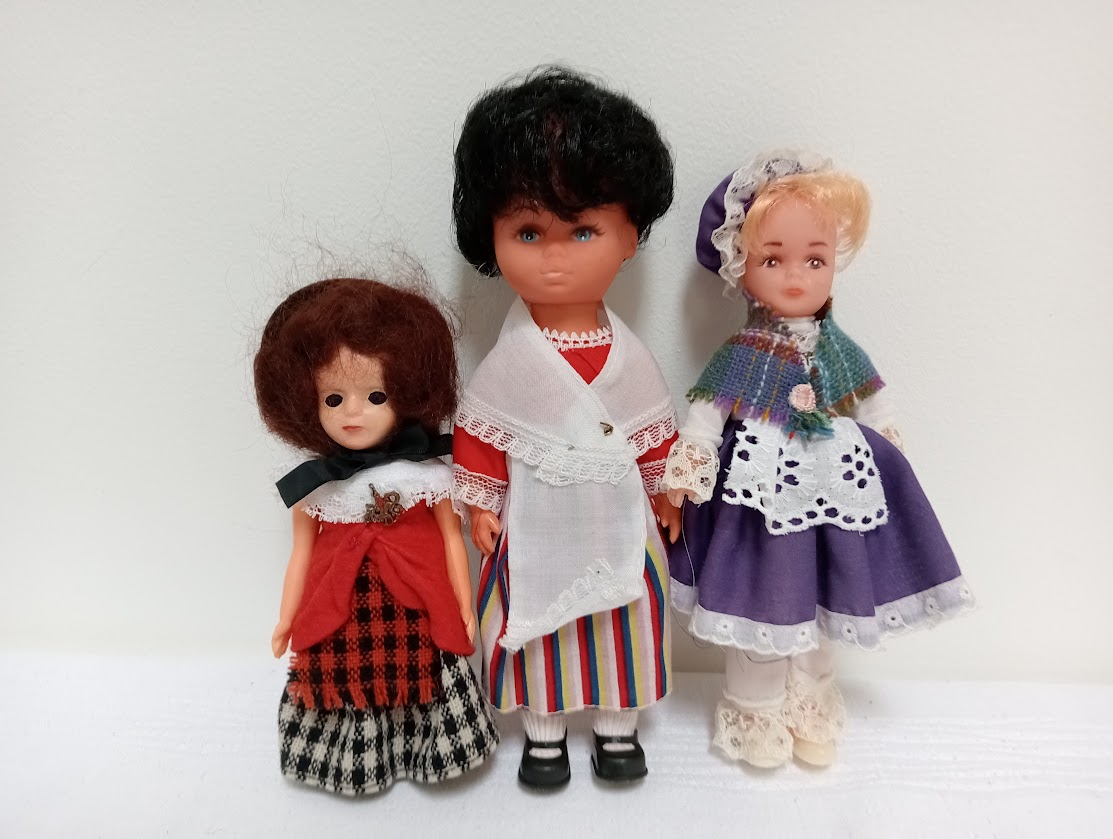 Two dolls from Wales and one from the Isle of Man