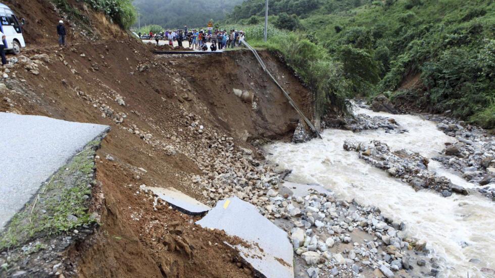 Vietnam Floods

In this Monday, June 25, 2018, photo, part of a road is collapsed by landslides in northern province of Lai Chau, Vietnam. Flash floods and landslides in northern Vietnam caused casual