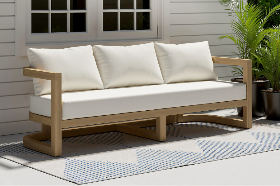 Sarpa Acacia Wood Outdoor Patio Sofa with sleek armrests and plush Linen White cushions, offering generous seating and a minimalist silhouette for elevated outdoor design.
