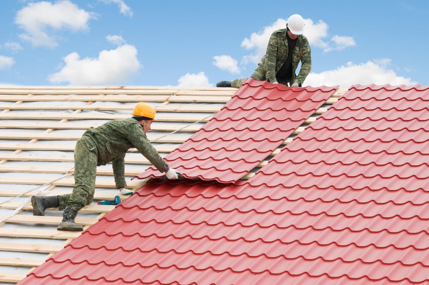 Men working on a roof

Description automatically generated