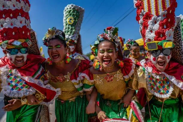 Revelers perform during the Batalla de Flores parade in the framework of the Barranquilla Carnival in Barranquilla, Colombia on February 11, 2024.