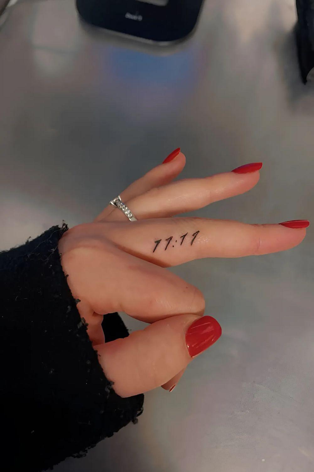 Numerical Finger Tattoo