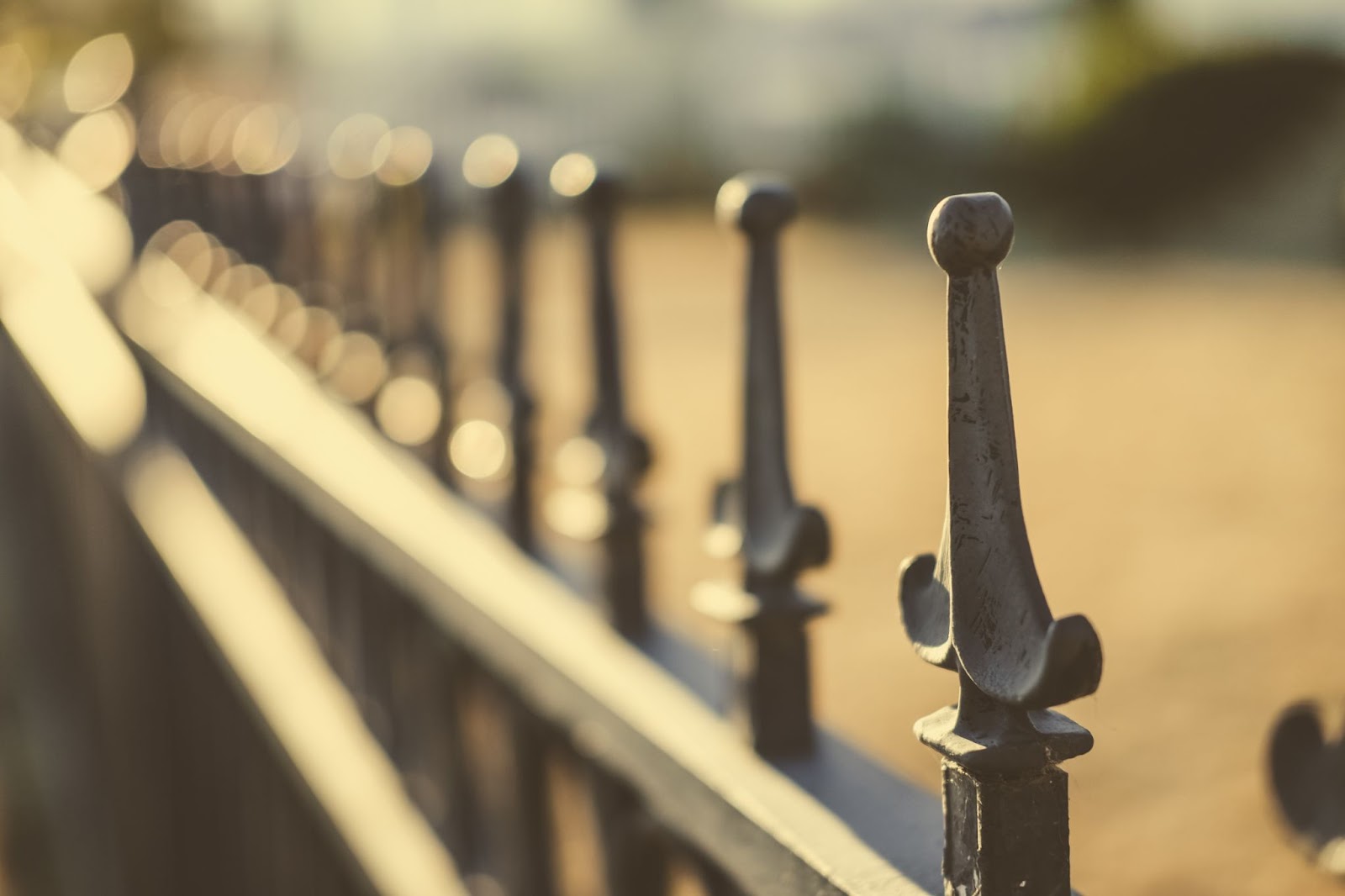 Close view of a decorative aluminum fence. 