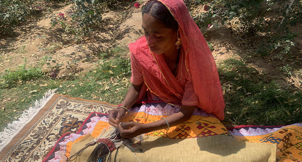 Sushila Nath doing beadwork